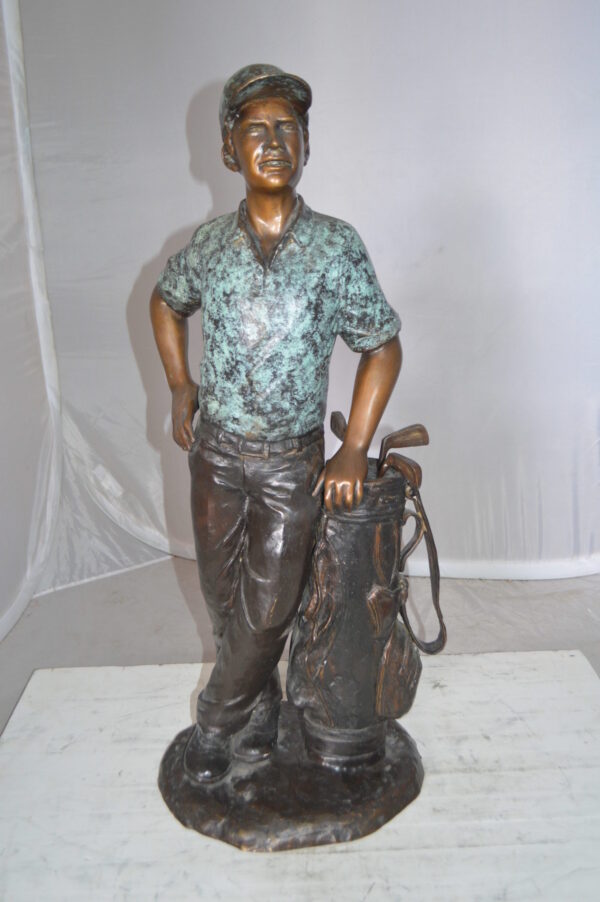 Golfer with bag Bronze Statue -  Size: 12"L x 13"W x 32"H.