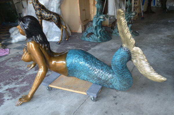 Mermaid Lying in the Sun Bronze Statue -  Size: 87"L x 44"W x 36"H.