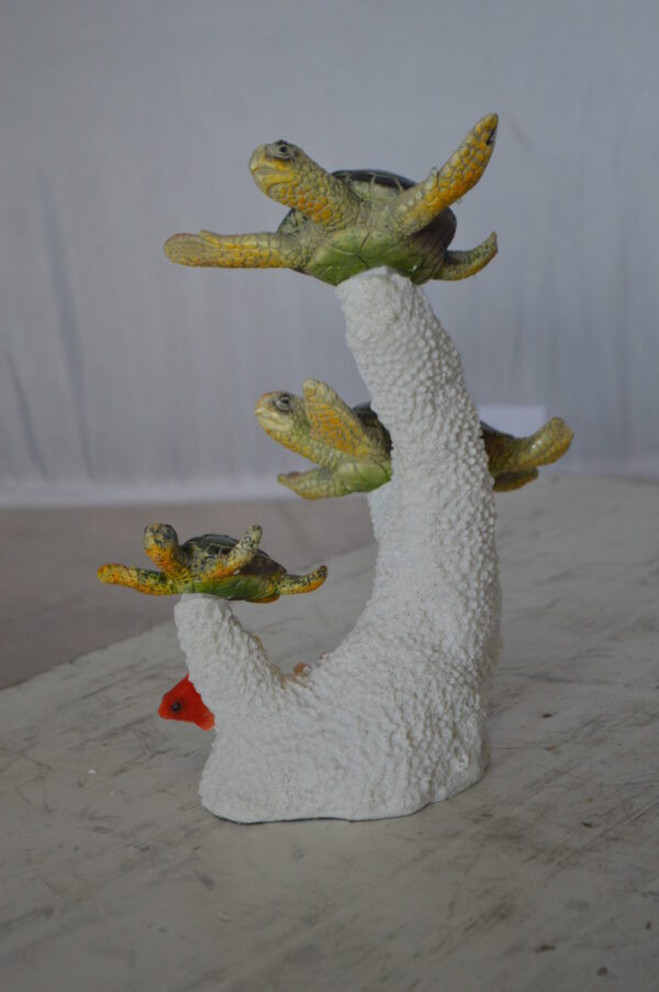 Three Turtles Swimming Resin Statue -  Size: 8"L x 8"W x 10"H.