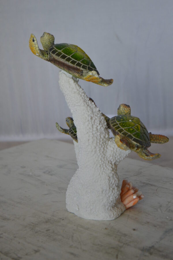 Three Turtles Swimming Resin Statue -  Size: 8"L x 8"W x 10"H.