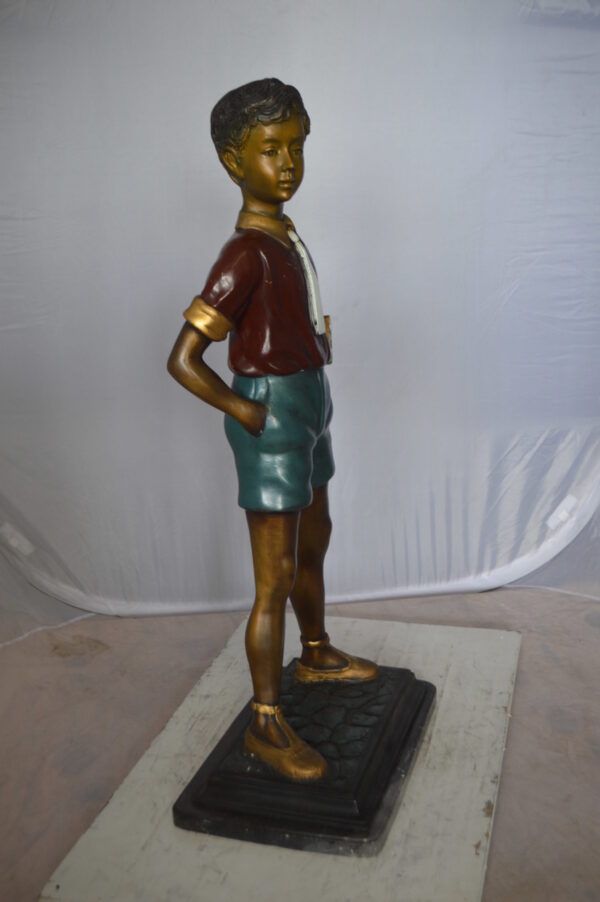 Kid Holding a Book Bronze Statue -  Size: 18"L x 11"W x 36"H.