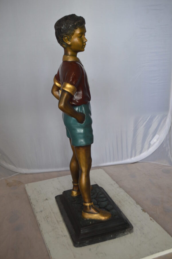 Kid Holding a Book Bronze Statue -  Size: 18"L x 11"W x 36"H.