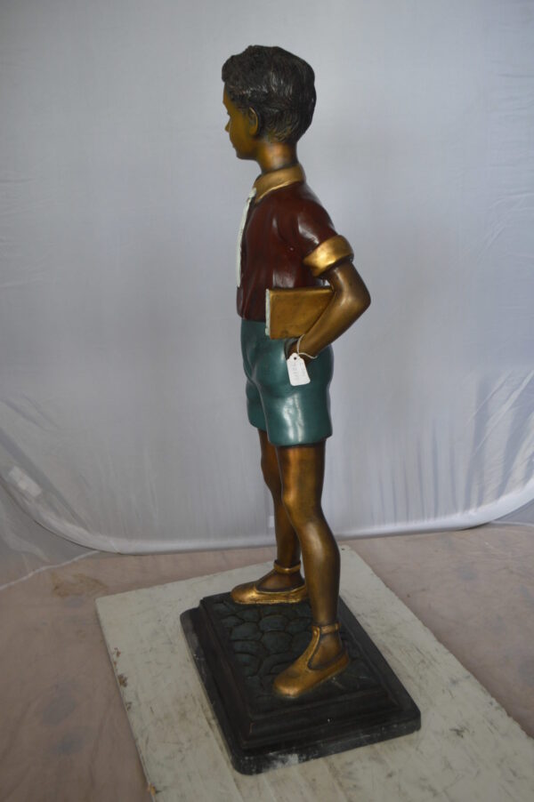 Kid Holding a Book Bronze Statue -  Size: 18"L x 11"W x 36"H.