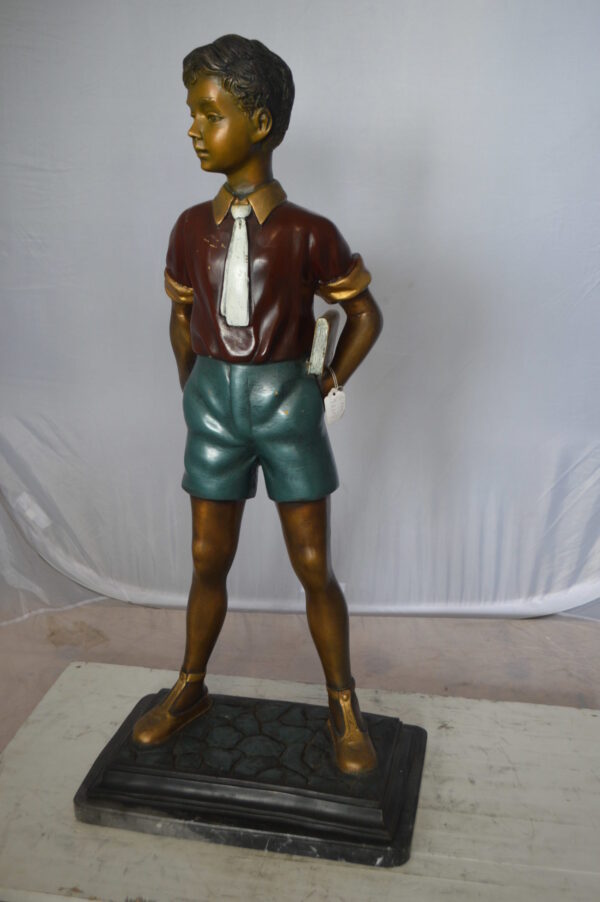 Kid Holding a Book Bronze Statue -  Size: 18"L x 11"W x 36"H.