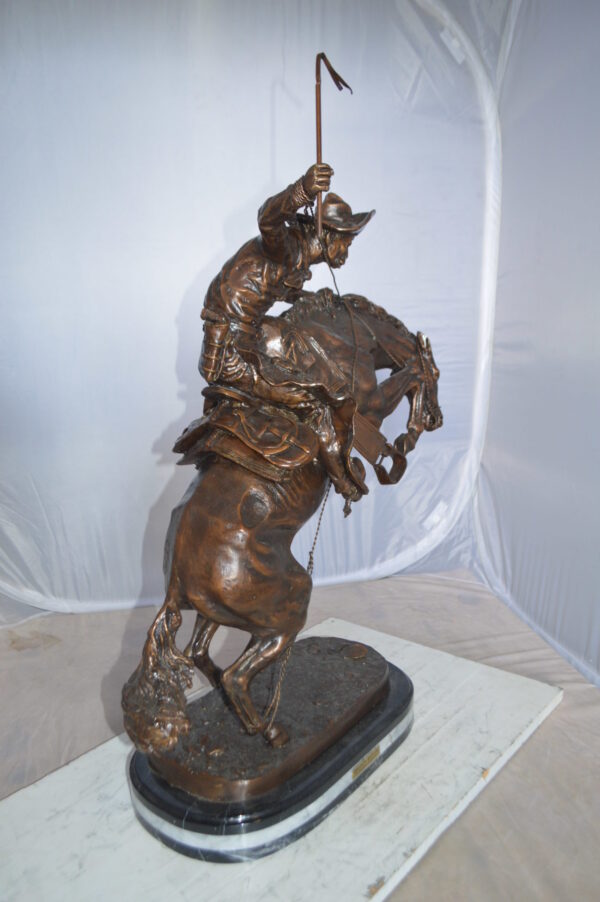 Jumbo Bronco Buster  by Remington Bronze Statue -  Size: 19"L x 11"W x 36"H.