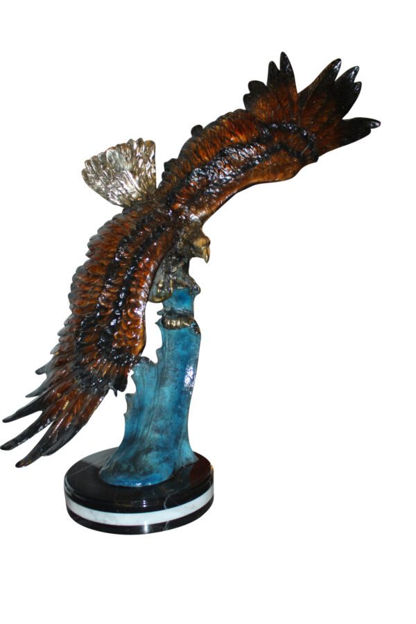 Eagle on a wave - Bronze Statue -  Size: 32"L x 12"W x 34"H.