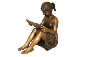 Girl Sitting and Reading a Book Bronze Statue -  Size: 23"L x 15"W x 24"H.