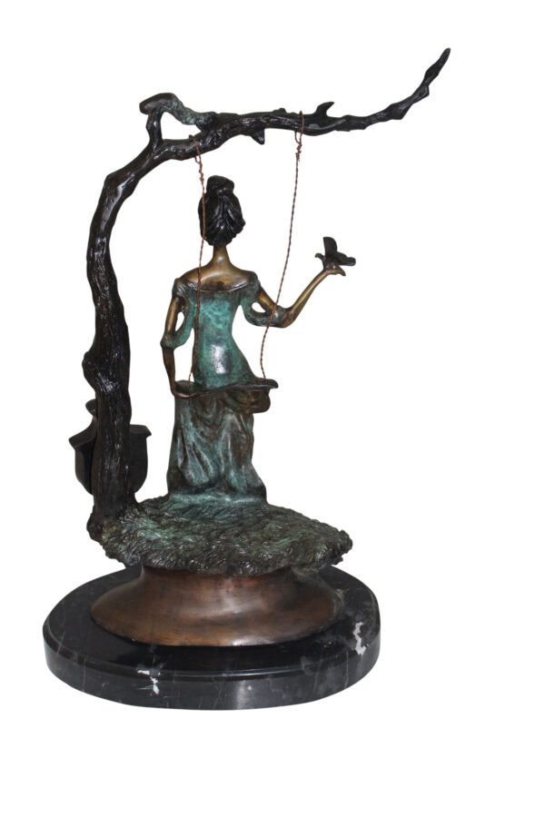 Girl on a swing Bronze Statue -  Size: 15"L x 8"W x 21"H.