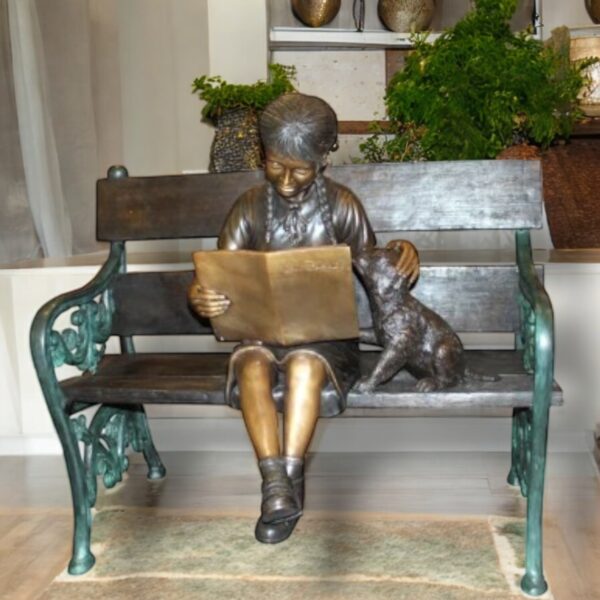 Girl sitting with her dog  on a bench,  reading Bronze Statue - 27" x 39" x 32"H - Image 2