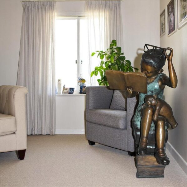 Girl sitting on a stack of books reading a book Bronze Statue -  17"x 18"x 36"H - Image 2