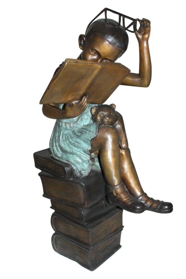 Girl sitting on a stack of books reading a book Bronze Statue -  17"x 18"x 36"H