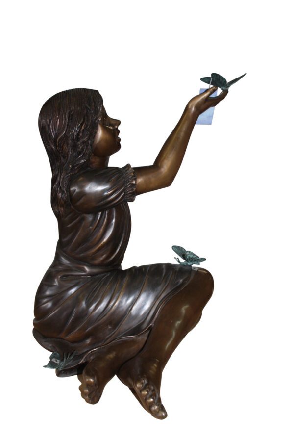 Girl with butterflies  - Bronze Statue -  Size: 27"L x 17"W x 24"H.