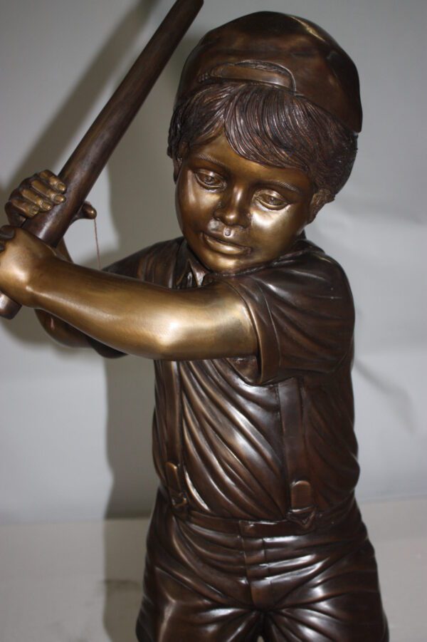 Golfer Boy Bronze - Big shoes -  Size: 18"L x 14"W x 49"H.