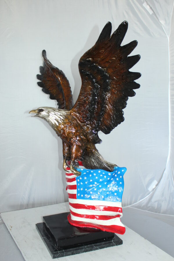 Eagle with American Flag Bronze Statue -  Size: 32"L x 14"W x 35"H.