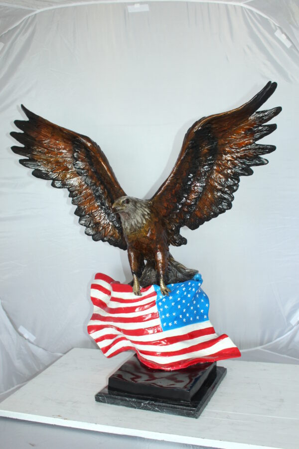 Eagle with American Flag Bronze Statue -  Size: 32"L x 14"W x 35"H.