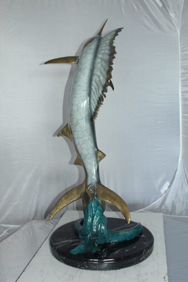 One Sailfish Jumping of the ware - Bronze Statue -  Size: 16"L x 16"W x 39"H.