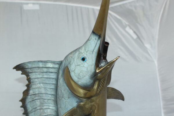 One Sailfish Jumping of the ware - Bronze Statue -  Size: 16"L x 16"W x 39"H.