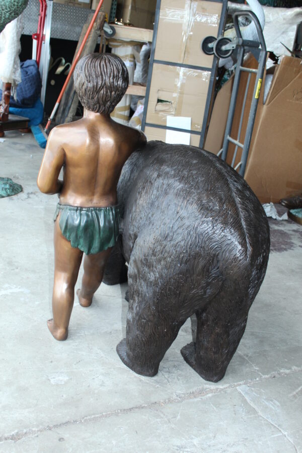 A bear with a boy bronze statue -  Size: 39"L x 24"W x 32"H. - Image 8