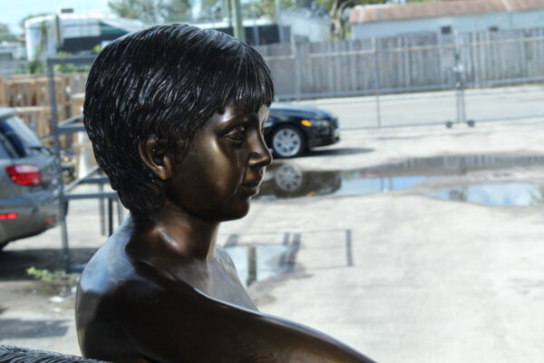 A bear with a boy bronze statue -  Size: 39"L x 24"W x 32"H. - Image 11