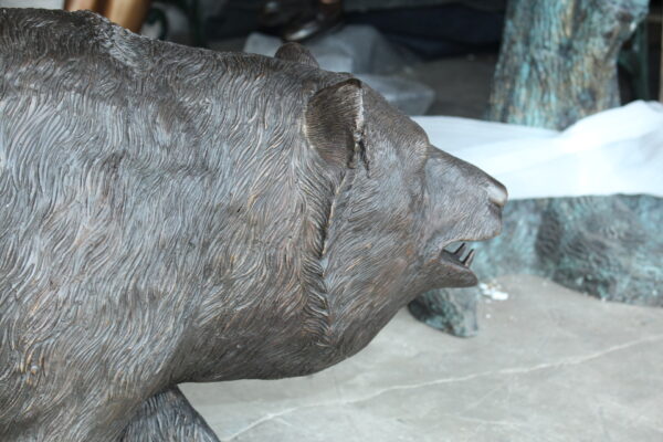 A bear walking Bronze Statue -  Size: 39"L x 12"W x 24"H.