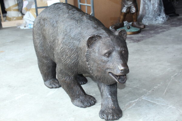 A bear walking Bronze Statue -  Size: 39"L x 12"W x 24"H.