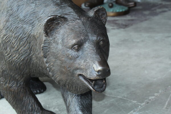 A bear walking Bronze Statue -  Size: 39"L x 12"W x 24"H.