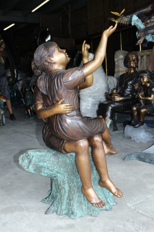 Two Kids Playing with Butterflies Bronze Statue -  Size: 30"L x 30"W x 50"H.