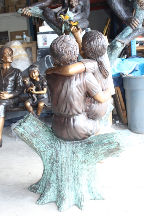 Two Kids Playing with Butterflies Bronze Statue -  Size: 30"L x 30"W x 50"H.