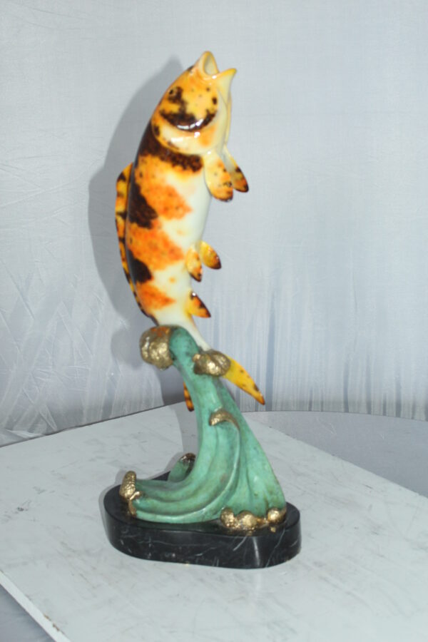 Coy Fish Jumping off the Water Bronze Statue -  Size: 10"L x 9"W x 22"H.