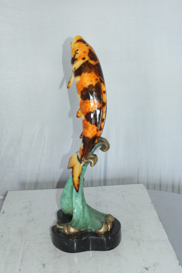 Coy Fish Jumping off the Water Bronze Statue -  Size: 10"L x 9"W x 22"H.