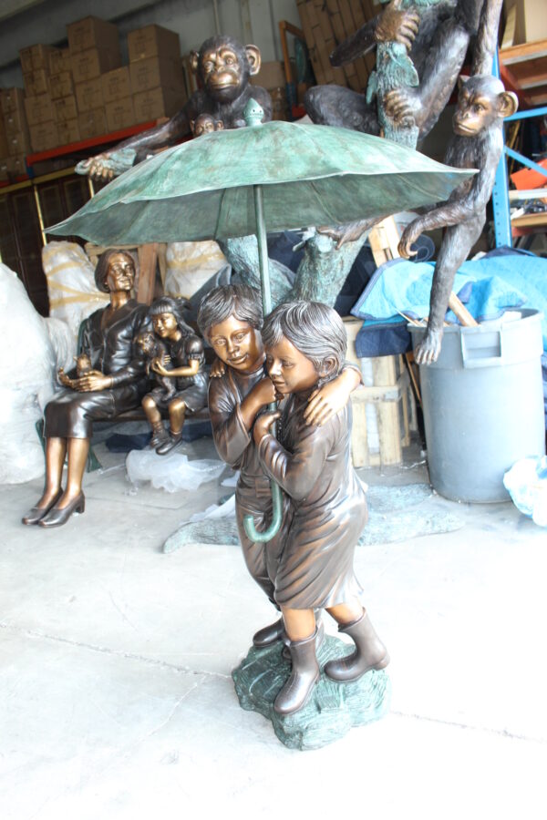 Two Kids Holding an Umbrella - Bronze Statue - Fountain -  90"L x 34"W x 90"H.