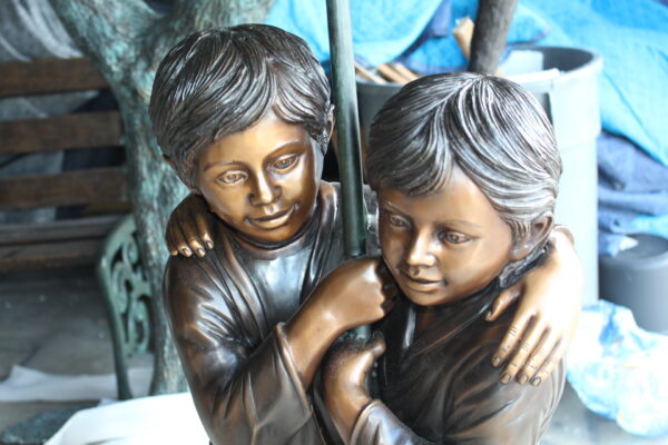 Two Kids Holding an Umbrella - Bronze Statue - Fountain -  90"L x 34"W x 90"H.