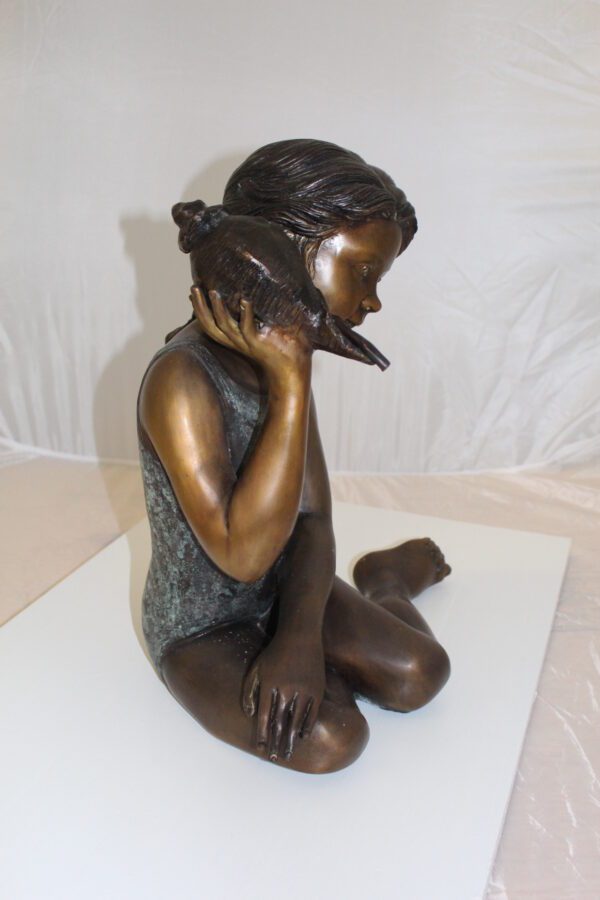 Girl listening to a Shell fountain-Bronze Statue -  Size: 17"L x 10"W x 20"H.