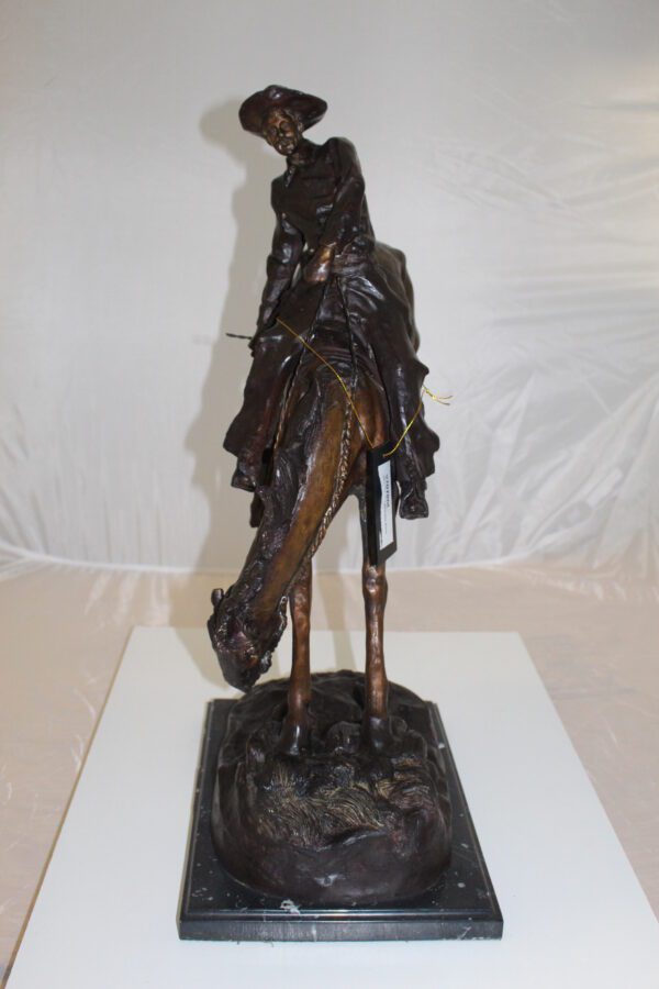 Outlaw Remington Bronze Statue -  Size: 19"L x 10"W x 26"H.