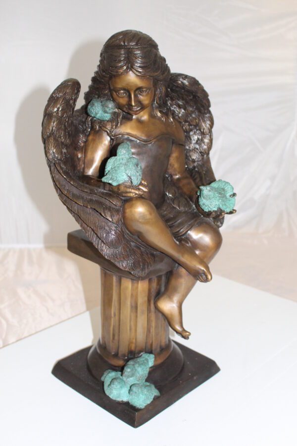 Angel sitting on Column Bronze Statue -  Size: 10"L x 9"W x 22"H.