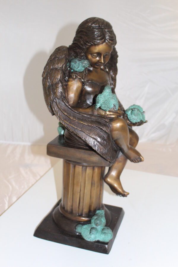 Angel sitting on Column Bronze Statue -  Size: 10"L x 9"W x 22"H.