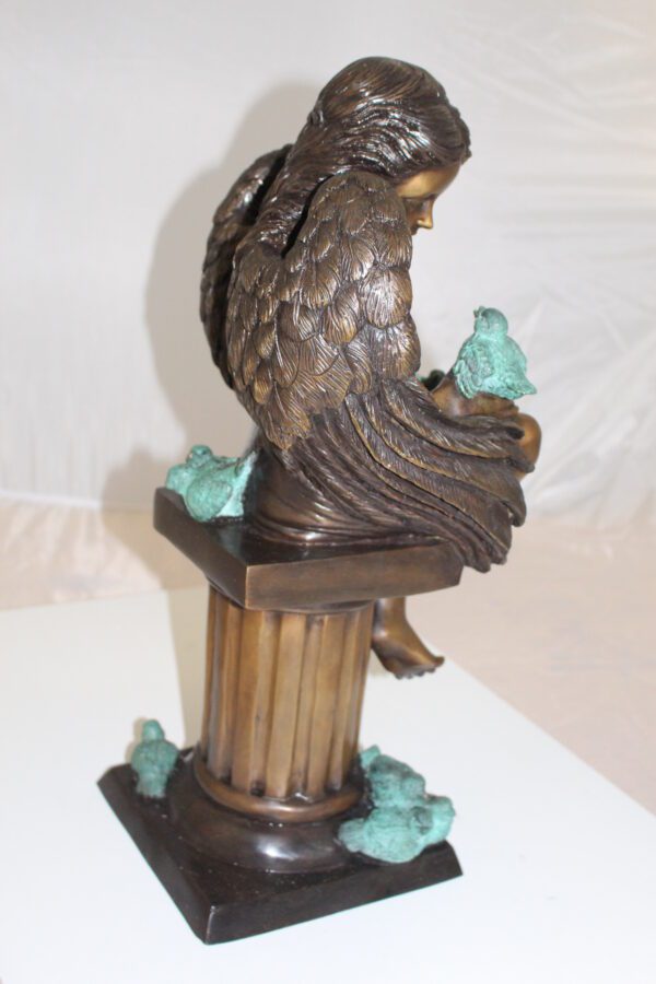 Angel sitting on Column Bronze Statue -  Size: 10"L x 9"W x 22"H.