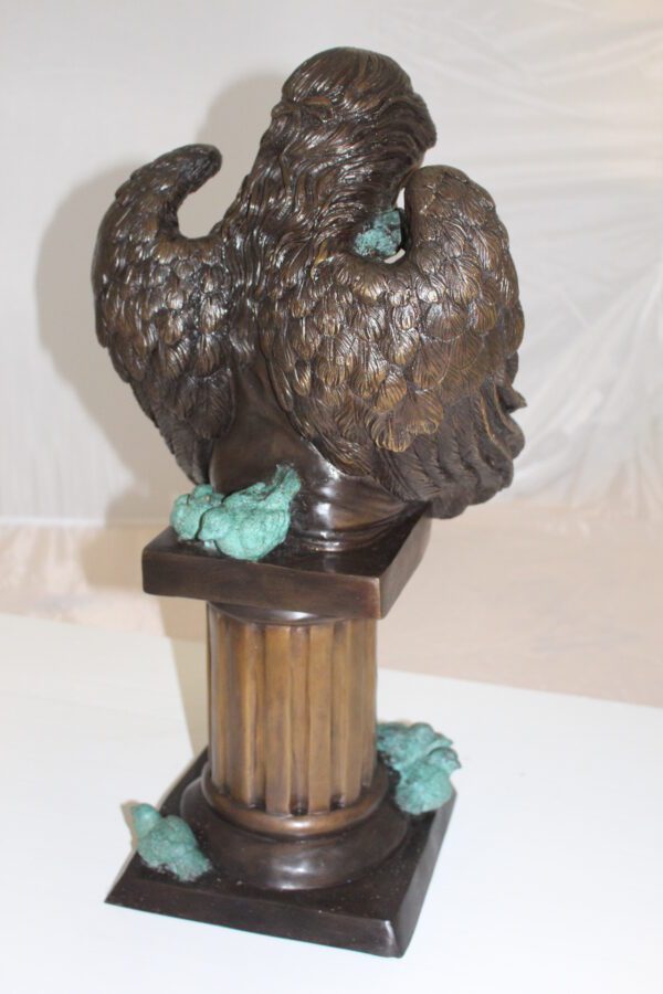 Angel sitting on Column Bronze Statue -  Size: 10"L x 9"W x 22"H.