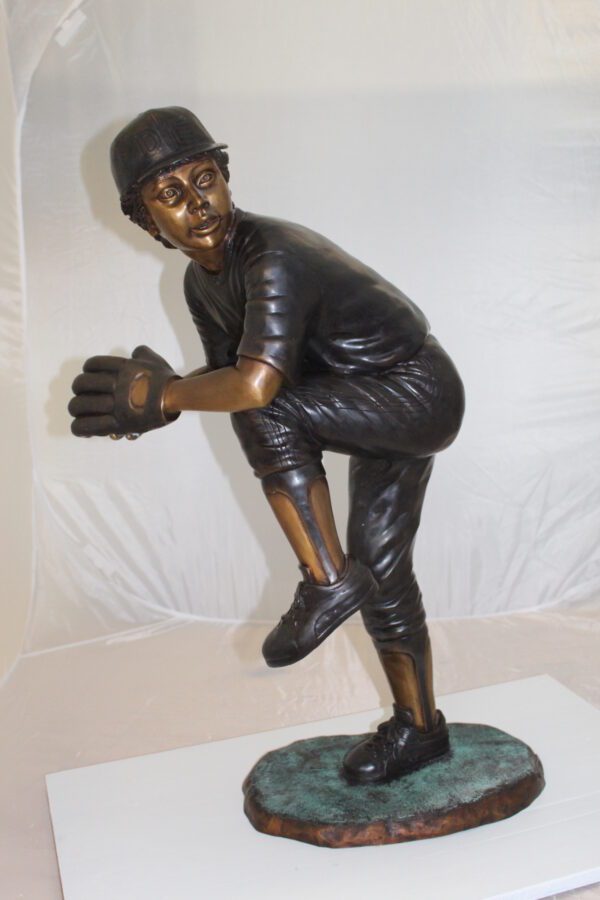 Boy plays baseball Bronze Statue -  Size: 22"L x 12"W x 36"H.