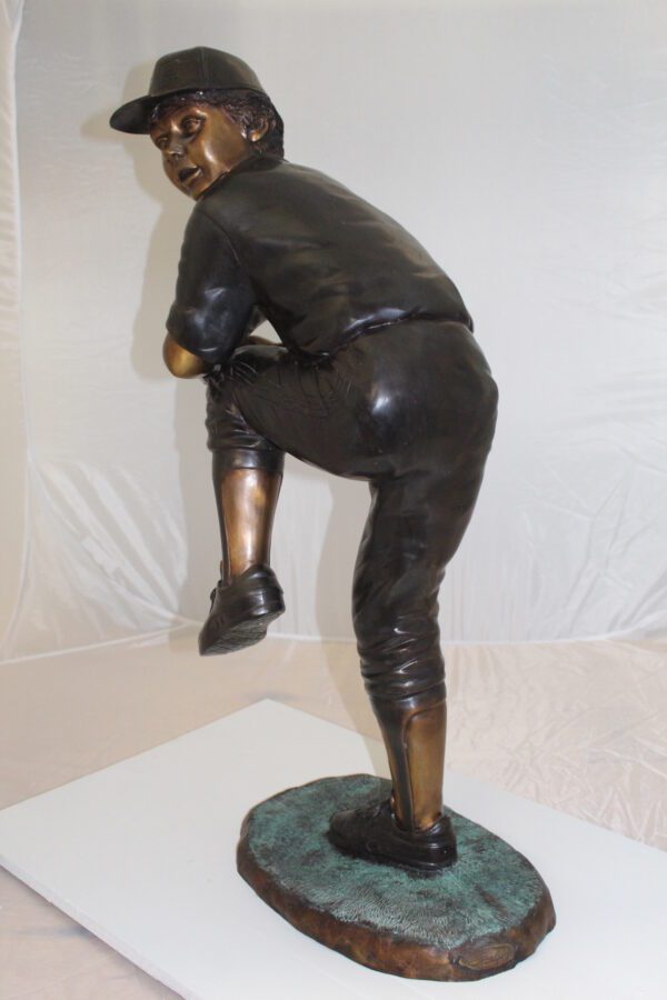 Boy plays baseball Bronze Statue -  Size: 22"L x 12"W x 36"H.