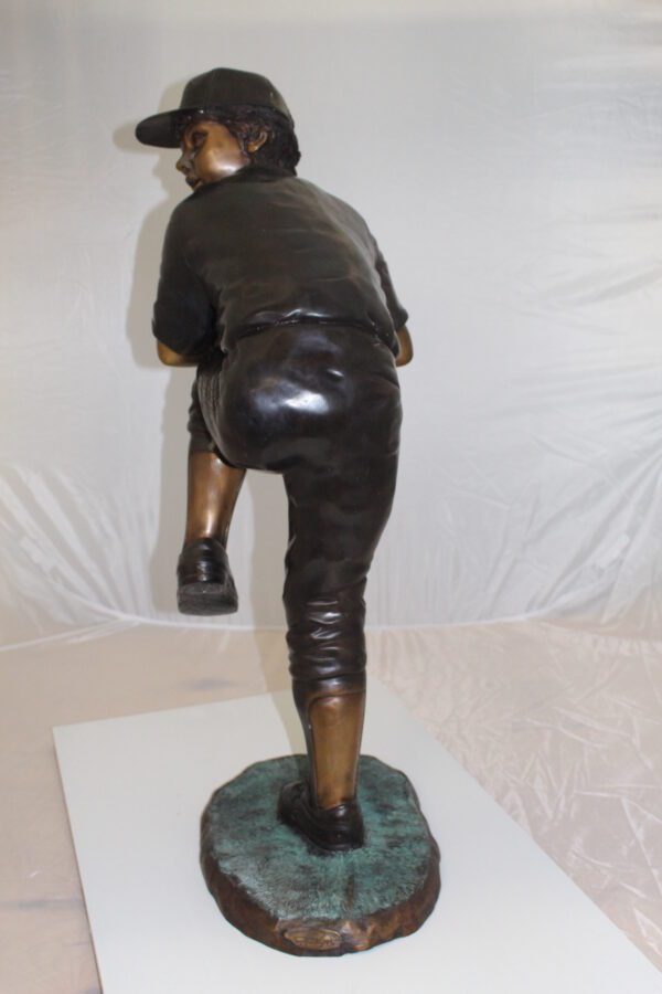 Boy plays baseball Bronze Statue -  Size: 22"L x 12"W x 36"H.