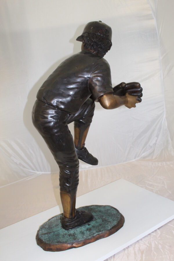 Boy plays baseball Bronze Statue -  Size: 22"L x 12"W x 36"H.