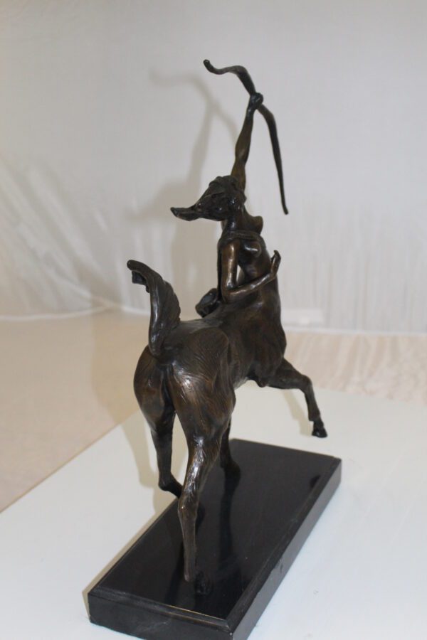 horse woman shooting an arrow Bronze Statue -  Size: 14"L x 6"W x 20"H.