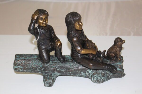 Two kids with dog on log Bronze Statue -  Size: 12"L x 5"W x 8.5"H.