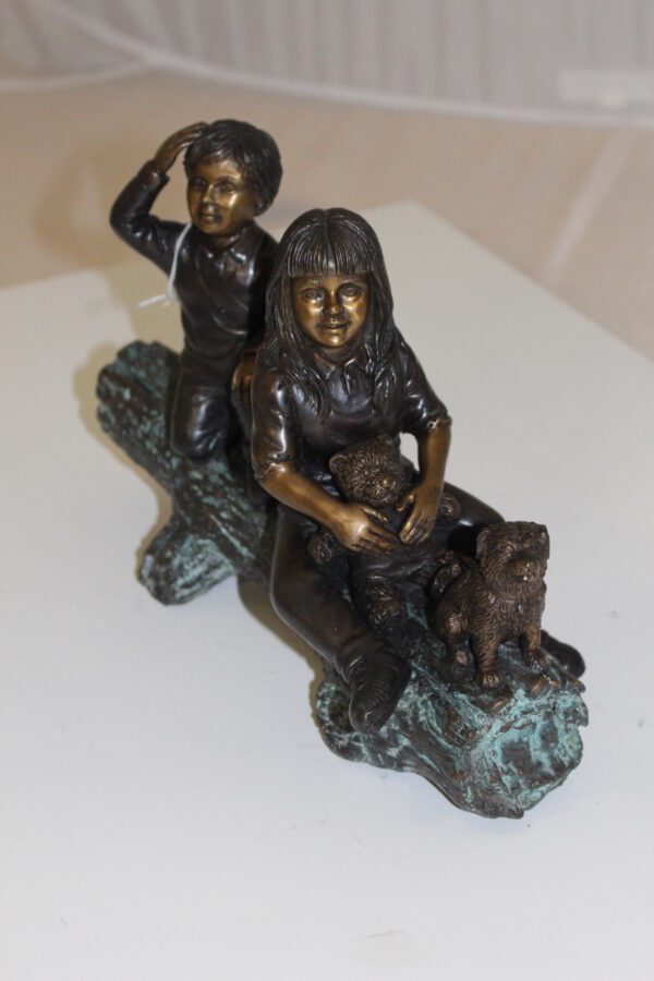 Two kids with dog on log Bronze Statue -  Size: 12"L x 5"W x 8.5"H.