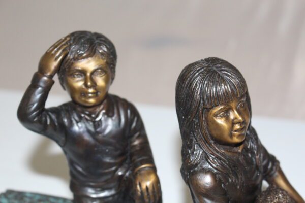 Two kids with dog on log Bronze Statue -  Size: 12"L x 5"W x 8.5"H.