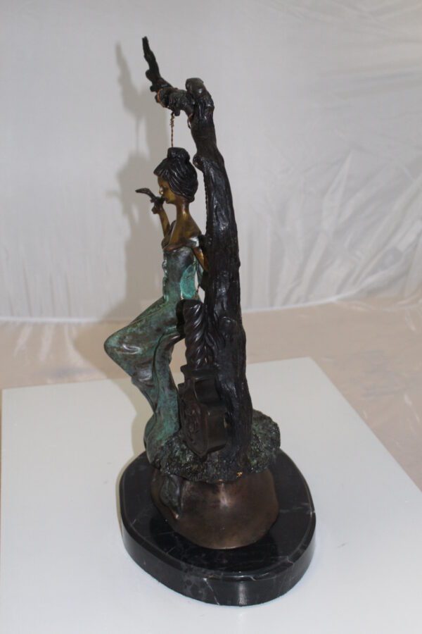 Girl on a swing Bronze Statue -  Size: 15"L x 8"W x 21"H.