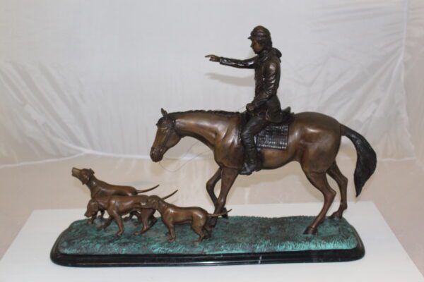 Hunter with 3 dogs Bronze Statue -  Size: 26"L x 8"W x 19"H.