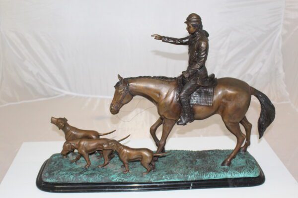 Hunter with 3 dogs Bronze Statue -  Size: 26"L x 8"W x 19"H.