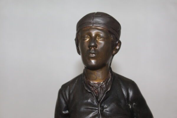 Boy standing Bronze Statue -  Size: 7.5"L x 7.5"W x 23.5"H.